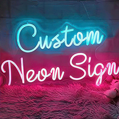 The words "Custom neon sign" in blue and pink LED