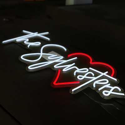 Example idea of a neon wedding sign - Name of the happy couple, The Sylvesters