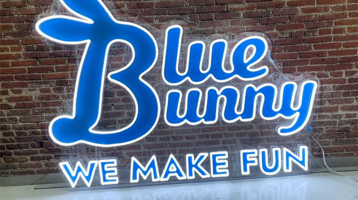 Load video: Blue Bunny Neon Sign - Office and event neon sign example