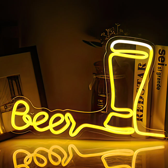 Beer word and glass in LED neon lights in white and yellow