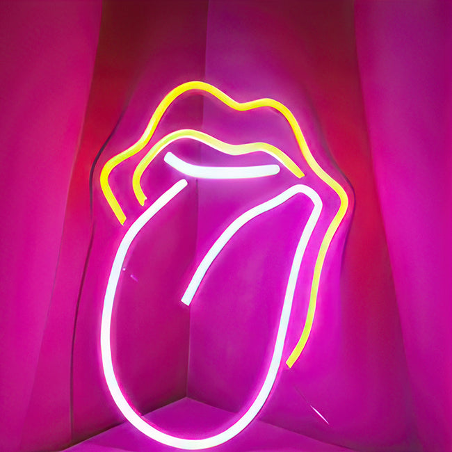 Neon womans tongue / mouth lit in yellow and white LED lights