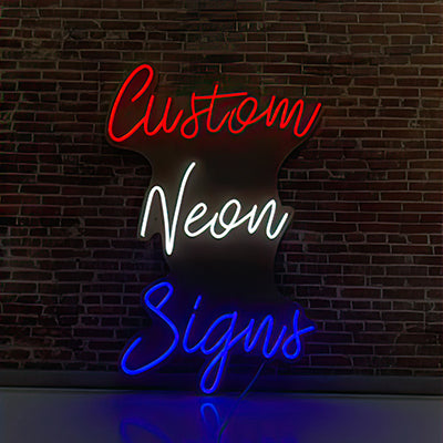 Custom neon signs - red white and blue, vertical on a brick wall