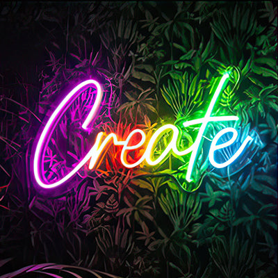 LED sign saying the word Create in multiple colors
