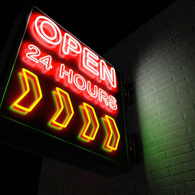 Open 24 hours LED neon sign outside a business