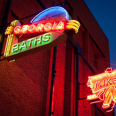 Georgia Baths neon sign on wall