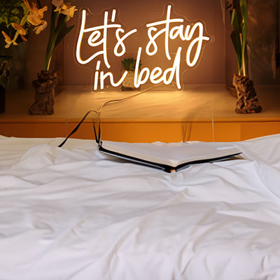 Let's Stay In Bed neon sign in warm white LED