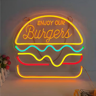 A neon sign with a picture of a burger and the words Enjoy our Burgers in yellow, turquoise, red and orange lights
