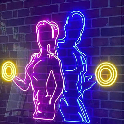 Posing man and woman outline in LED neon sign idea for a gym