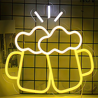 Beers clinking together with frothy top in white and yellow LED neon light