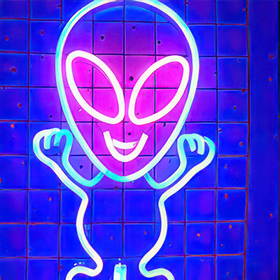 Light sign picture of a smiling alien in white, blue and pink colors