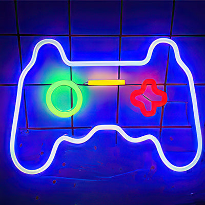 Playstation controller in blue, green, yellow and red colosr in LED light