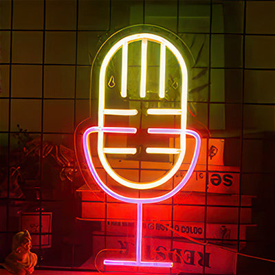 Pink and yellow picture of a microphone in LED lights