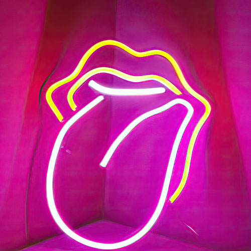Neon wall decoration with pink LED tongue sticking out of a yellow LED light mouth