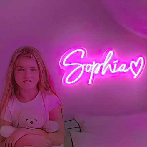 Neon name sign for Sophie written in pink LED lights script
